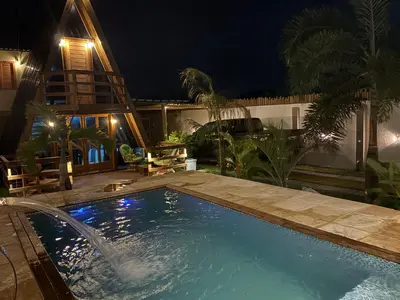 A piscina em ou perto de Chalé Cabana