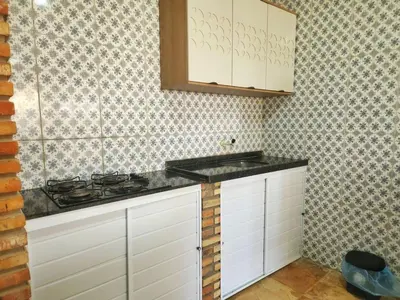 A cozinha ou kitchenette de Casa Pe na Areia com Piscina e Ar em Morro Branco
