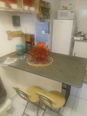 A cozinha ou kitchenette de Quarto Aconchegante