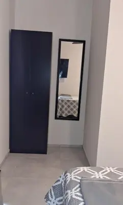 Uma cama ou camas num quarto em Flats Vento da Serra