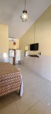 A cozinha ou kitchenette de Sua própria pousada na praia