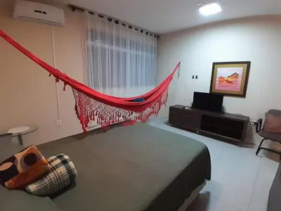 Uma cama ou camas num quarto em Magnata Praia