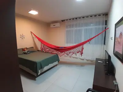 Uma televisão e/ou sistema de entretenimento em Magnata Praia