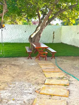 Um jardim no exterior de Casa de Praia no PREA para ate 12 pessoas