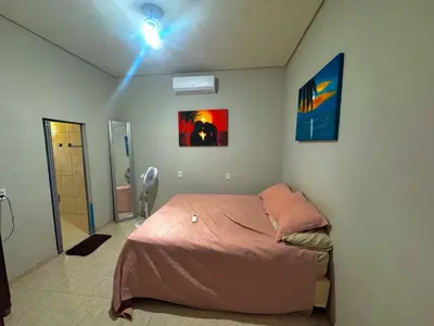 Uma cama ou camas num quarto em Casa de Praia no PREA para ate 12 pessoas