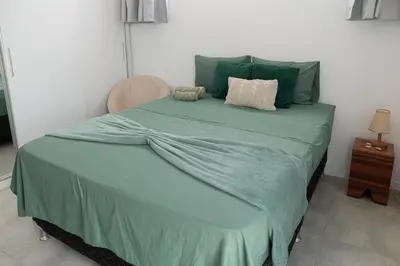 Uma cama ou camas num quarto em Kicoh - Kite Community House