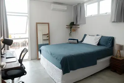 Uma cama ou camas num quarto em Kicoh - Kite Community House