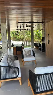 Uma área de estar em Guaramiranga casa aluguel
