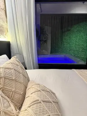 Uma cama ou camas num quarto em Luce del sole bangalô