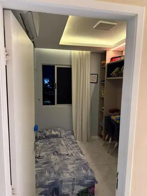 Uma cama ou camas num quarto em Apartamento top CAMBEBA