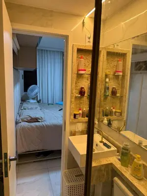 Uma cama ou camas num quarto em Apartamento top CAMBEBA