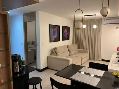 Uma área de estar em Apartamento Mobiliado Fortaleza - uma quadra da Beira Mar