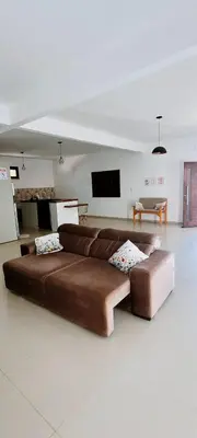 Uma televisão e/ou sistema de entretenimento em Casa Madalena - Praia de Lagoa do Mato