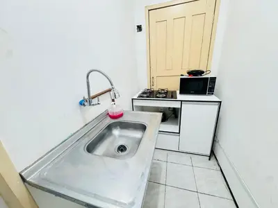 A cozinha ou kitchenette de ap 2 quartos com ar e garagem bairro derby
