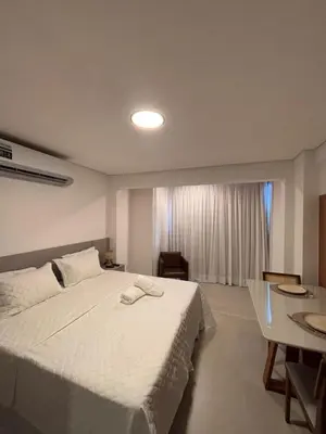 Uma cama ou camas num quarto em Beach class Meireles -412