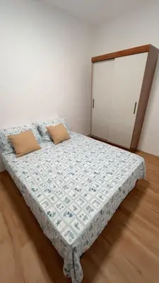Uma cama ou camas num quarto em Cantinho da Praia do Futuro
