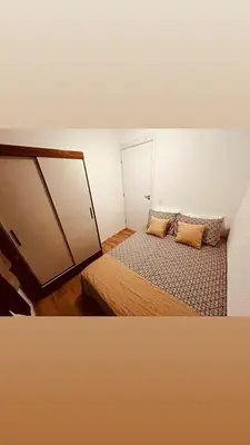 Uma cama ou camas num quarto em Cantinho da Praia do Futuro