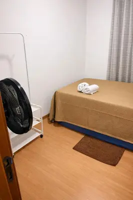 Uma cama ou camas num quarto em Apartamento em Fortaleza