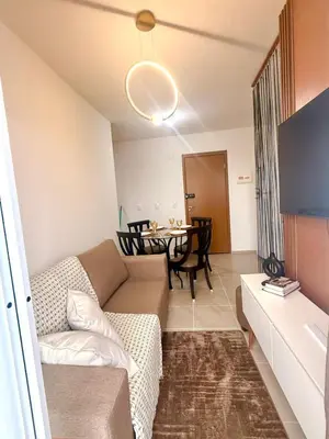 Uma área de estar em Apartamento em Fortaleza