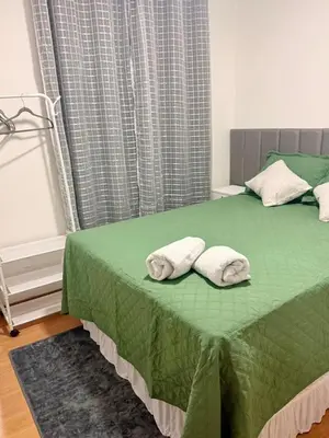 Uma cama ou camas num quarto em Apartamento em Fortaleza