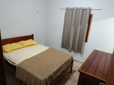 Uma cama ou camas num quarto em Camile vista da Serra-prime