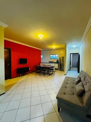 Uma área de estar em Apartamento Completo com Piscina e vista do mar a 5m do Beach Park