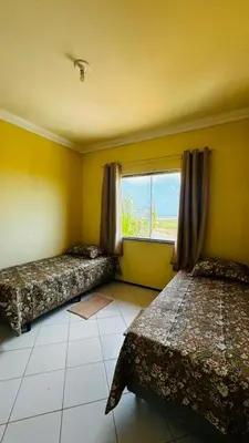 Uma cama ou camas num quarto em Apartamento Completo com Piscina e vista do mar a 5m do Beach Park