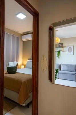 Uma cama ou camas num quarto em Stylish apartment with ocean view, right on the beach