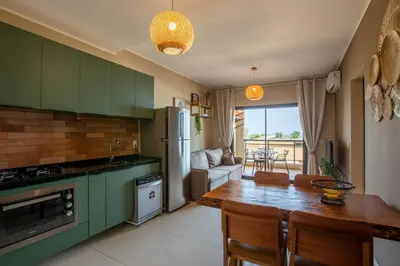 A cozinha ou kitchenette de Stylish apartment with ocean view, right on the beach