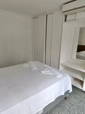 Uma cama ou camas num quarto em Flat atlantico 301
