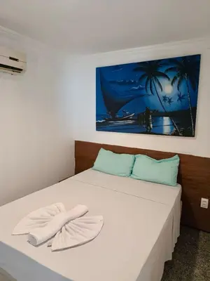 Uma cama ou camas num quarto em Flat atlantico 301