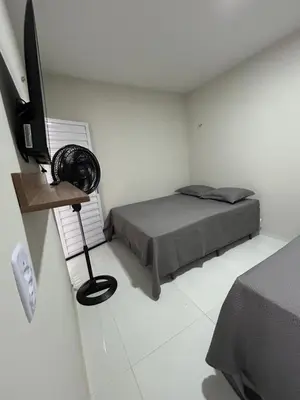Uma cama ou camas num quarto em Banabuiú Flats