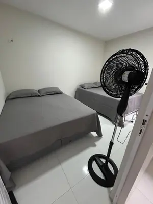 Uma cama ou camas num quarto em Banabuiú Flats