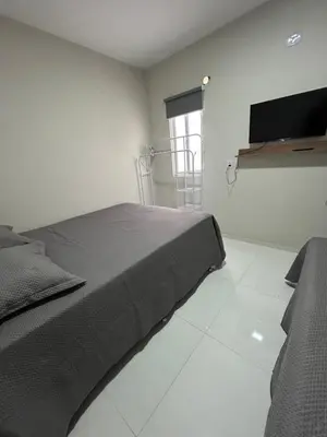 Uma cama ou camas num quarto em Banabuiú Flats