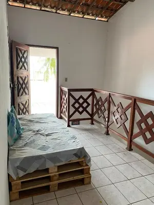 Uma cama ou camas num quarto em Comfortable house in Paracuru - Spacious and airy