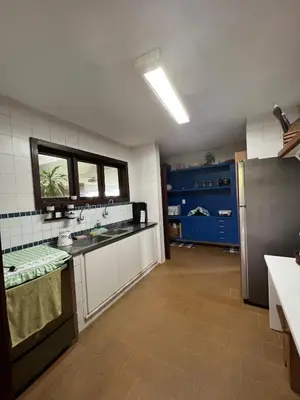 A cozinha ou kitchenette de Casa incrível com vista para o mar - próximo ao beach park