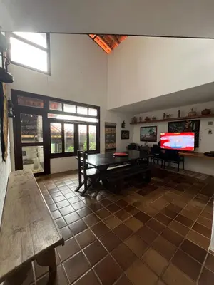 Uma televisão e/ou sistema de entretenimento em Casa incrível com vista para o mar - próximo ao beach park