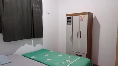 Uma cama ou camas num quarto em Duplex vizinho ao Resort Carmel