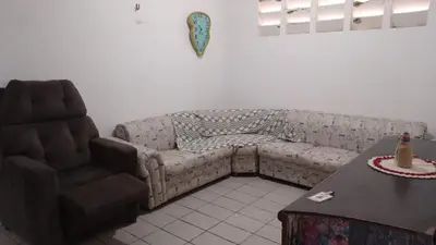 Uma área de estar em Duplex vizinho ao Resort Carmel