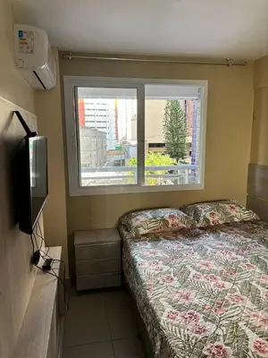 Uma cama ou camas num quarto em Helbor My Way Abolição