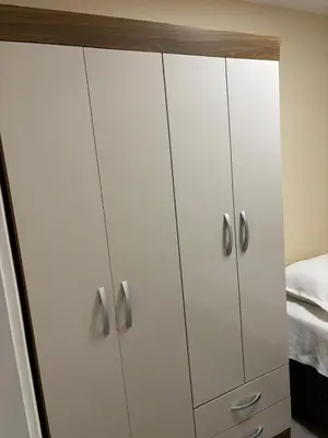 Uma cama ou camas num quarto em Helbor My Way Abolição