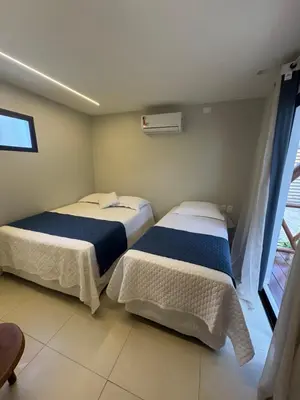 Uma cama ou camas num quarto em Residencial Vista Mar