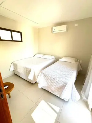 Uma cama ou camas num quarto em Residencial Vista Mar