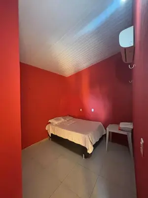 Uma cama ou camas num quarto em Pousada Raios do Sol