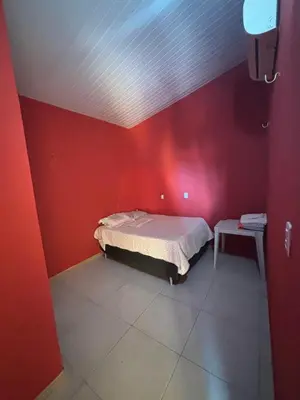 Uma cama ou camas num quarto em Pousada Raios do Sol
