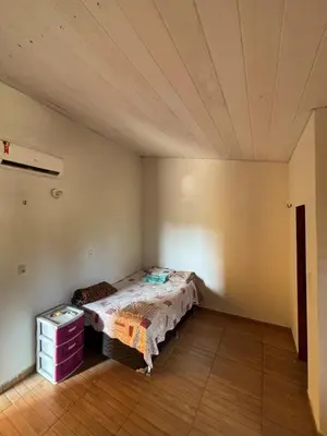 Uma cama ou camas num quarto em Pousada Raios do Sol