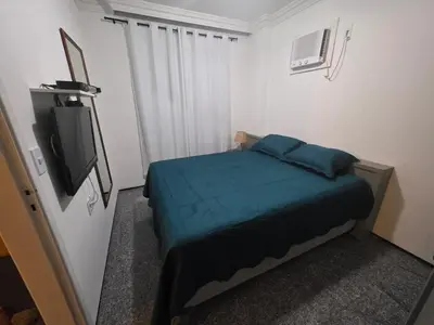 Uma cama ou camas num quarto em Tulip Inn flat - Meireles