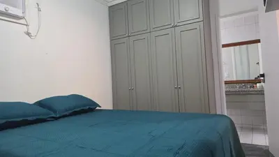 Uma cama ou camas num quarto em Tulip Inn flat - Meireles