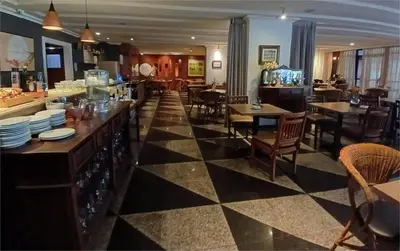 Um restaurante ou outro lugar para comer em Tulip Inn flat - Meireles
