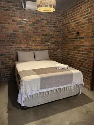 Uma cama ou camas num quarto em Villa chalé